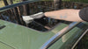 Cleaning the roof spot, then pressing the steel VHB plates down