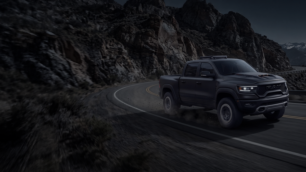 Pickup truck on a mountain highway with the SETBOX housing on the roof